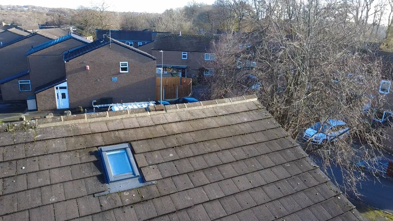 Emergency skylight repair on a residential roof